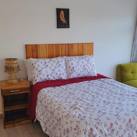 פלורס Apartamentos Mundo Maya Habitaciones מראה חיצוני תמונה