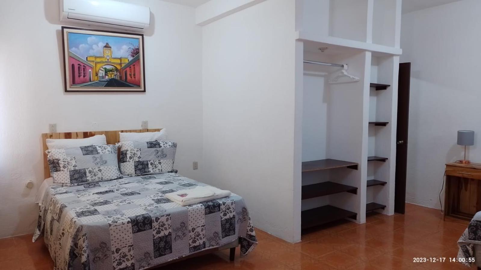 פלורס Apartamentos Mundo Maya Habitaciones מראה חיצוני תמונה