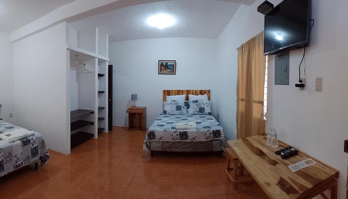 פלורס Apartamentos Mundo Maya Habitaciones מראה חיצוני תמונה