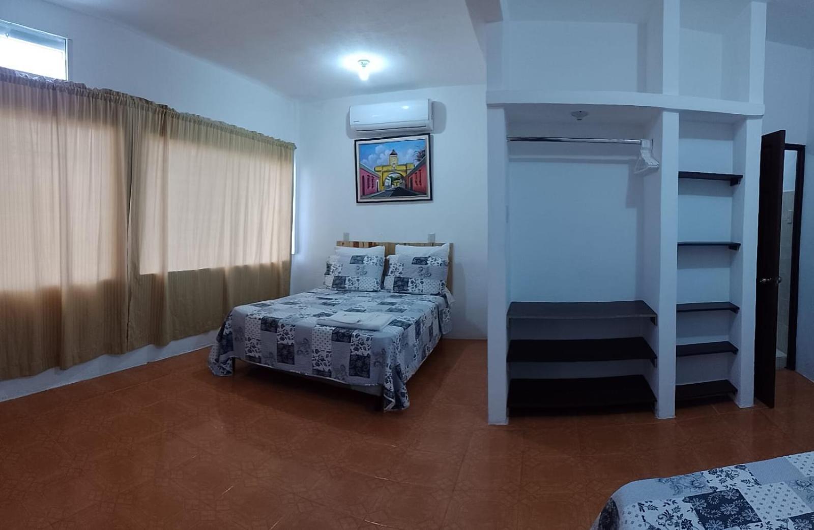 פלורס Apartamentos Mundo Maya Habitaciones מראה חיצוני תמונה